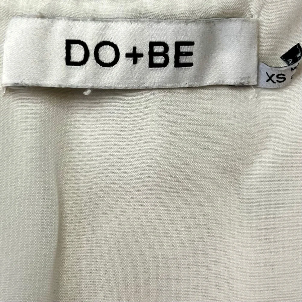 DO+BE Ivory Ruffle Peplum Blouse Sleeveless V-Neck Top XS - Picture 3 of 3